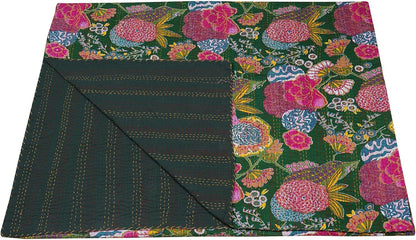 Floral patterned fabric with a dark green border on a white background