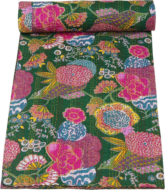 Colorful floral-patterned fabric roll on a green background