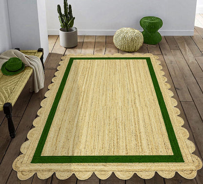 Natural Jute Area Rug with a scalloped edge and green border, perfect for adding texture to any indoor space.