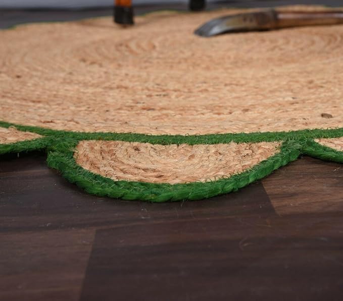 Coiled green and brown rope mat on a wooden surface
