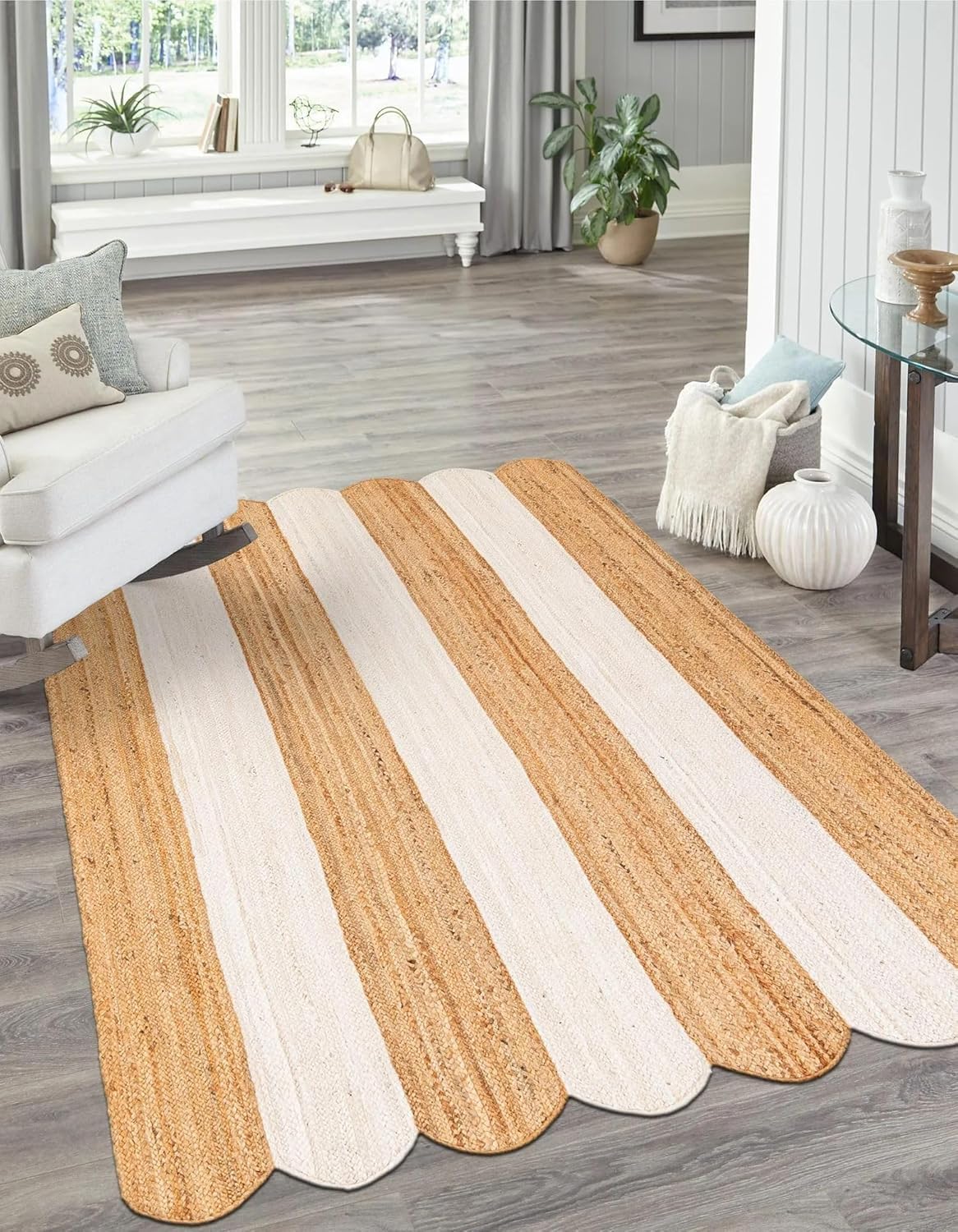 Striped area rug on a wooden floor with a living room setting.