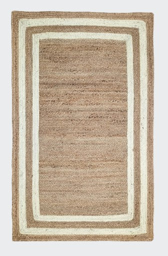 Rectangular jute rug with a white border on a light gray background