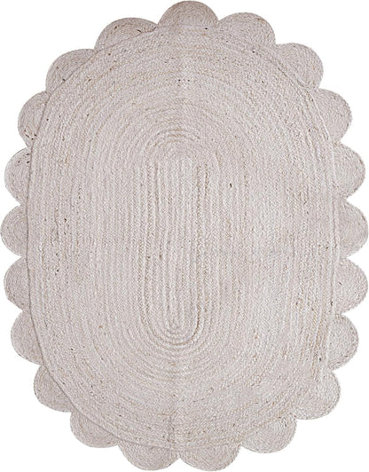 Round braided rug with scalloped edge on a white background