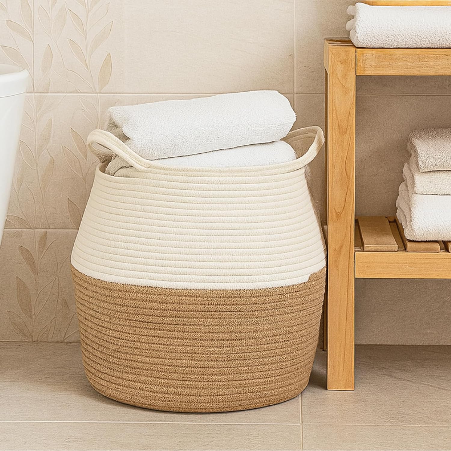 Handmade jute laundry basket with handles in natural beige and white color, large rope storage basket for clothes, baby laundry, toys, blankets, and home organization.