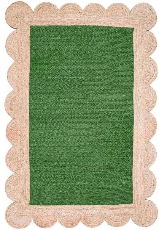 A rectangular green woven rug with a scalloped natural beige jute border, shown flat against a white background.