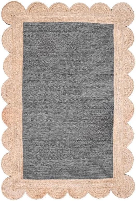 A rectangular area rug with a textured dark gray center and a natural beige scalloped jute border, shown flat against a white background.