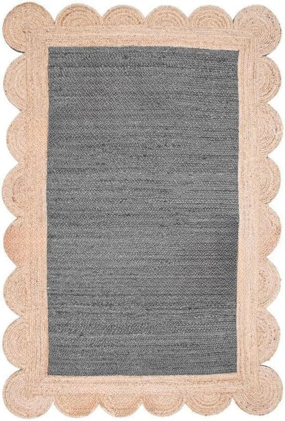 A rectangular area rug with a textured dark gray center and a natural beige scalloped jute border, shown flat against a white background.