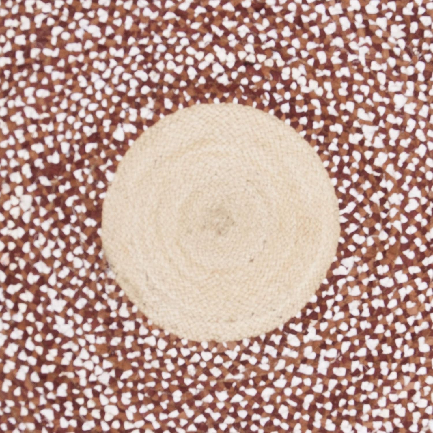 Natural Jute Area Rug featuring a textured design with a circular pattern, perfect for enhancing any living space.