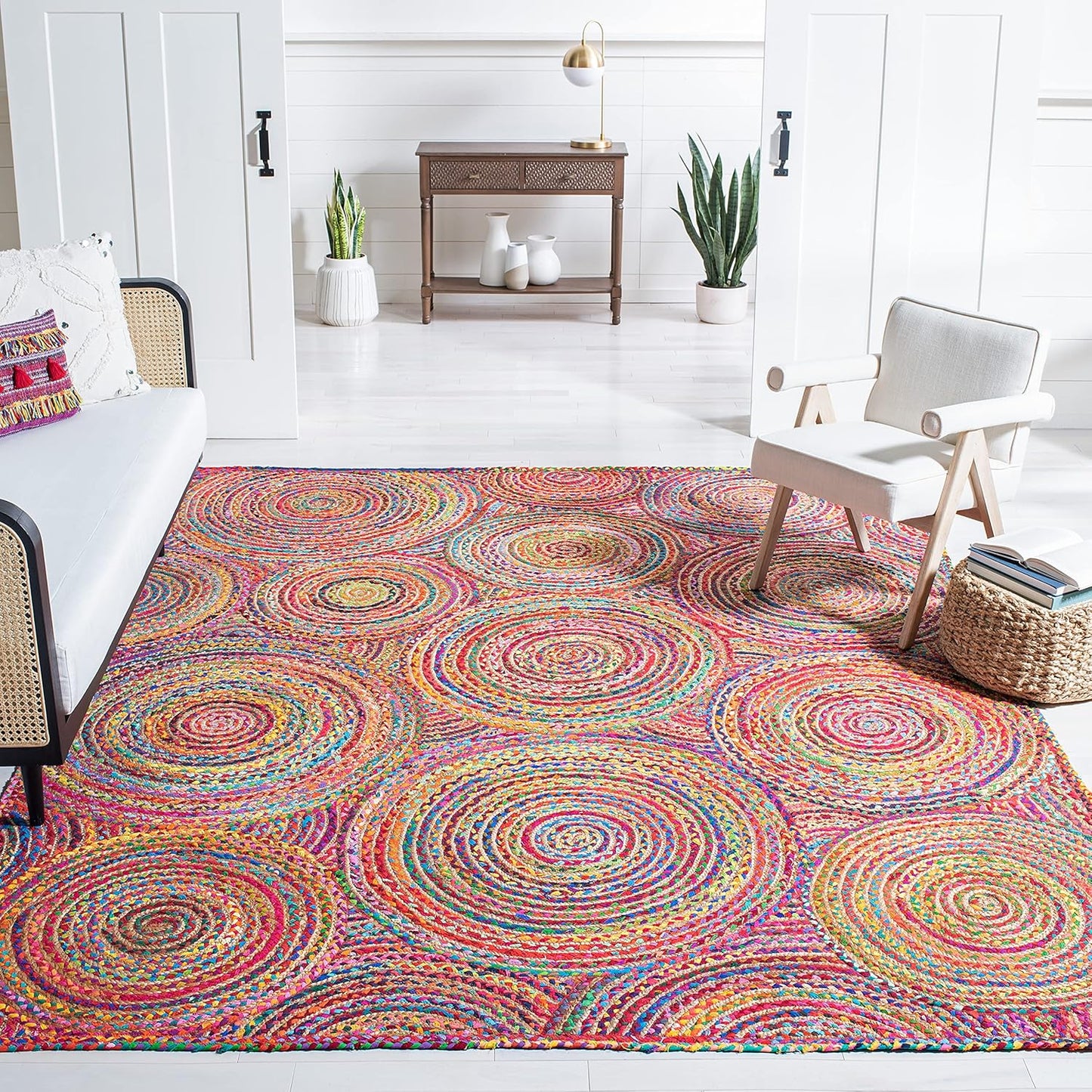 Natural Jute Area Rug with vibrant circular patterns, adding a colorful touch to any living space or entryway.