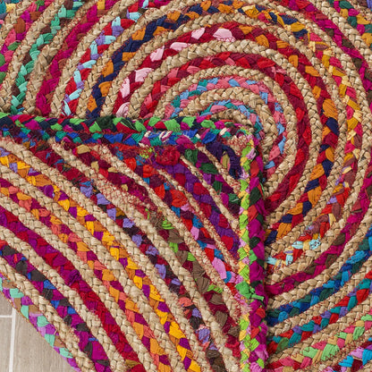 Vibrant Natural Jute Area Rug in a colorful spiral design — perfect as a decorative floor carpet or entryway rug.