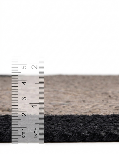 Measurement of a rug with a ruler showing dimensions