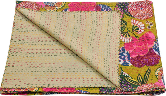 Colorful floral-patterned quilt with a folded edge