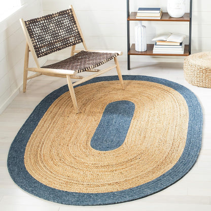 Oval braided rug with natural jute and navy blue accents, perfect for rustic home decor.