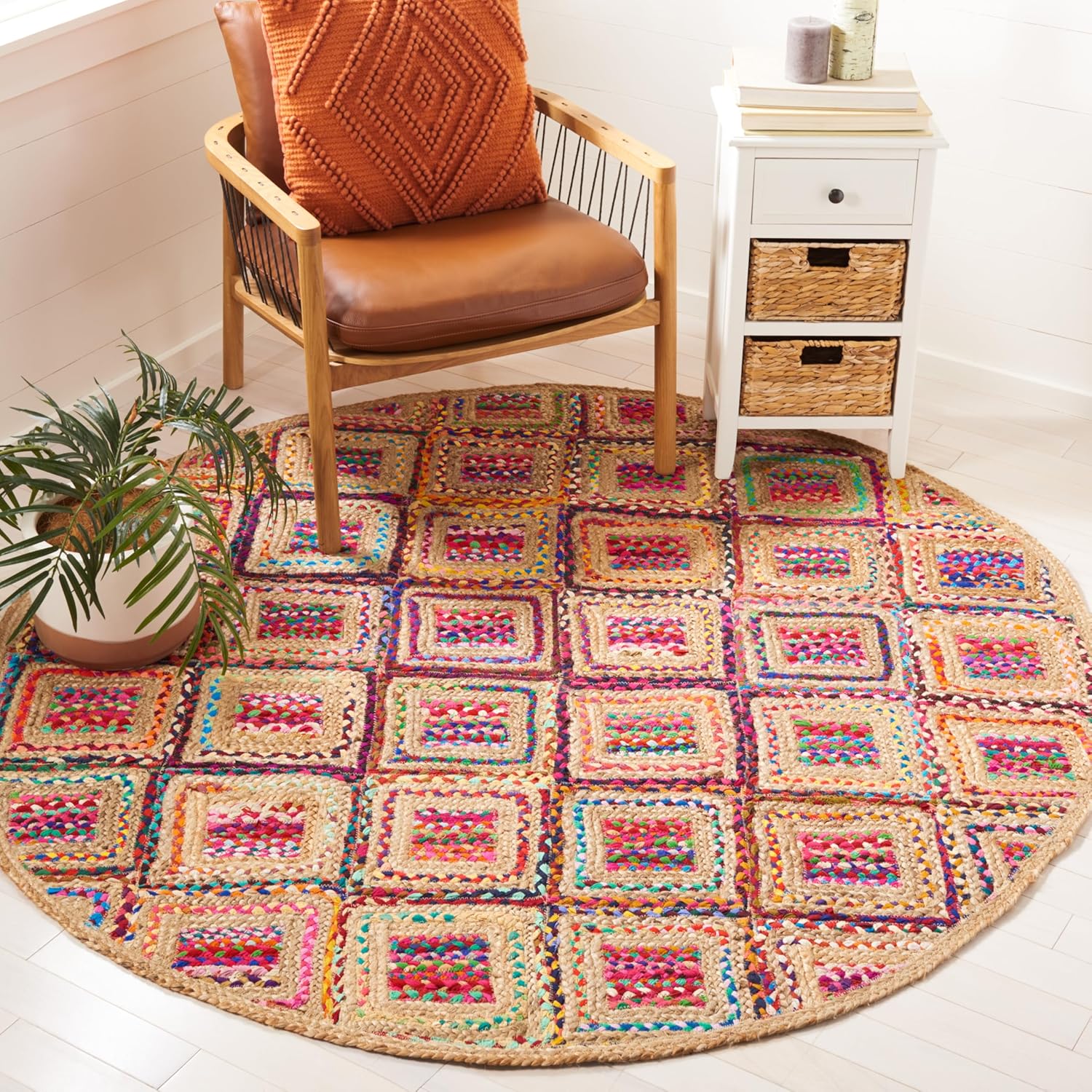 Colorful round jute rug with patterned squares, perfect for adding a vibrant touch to your living space.