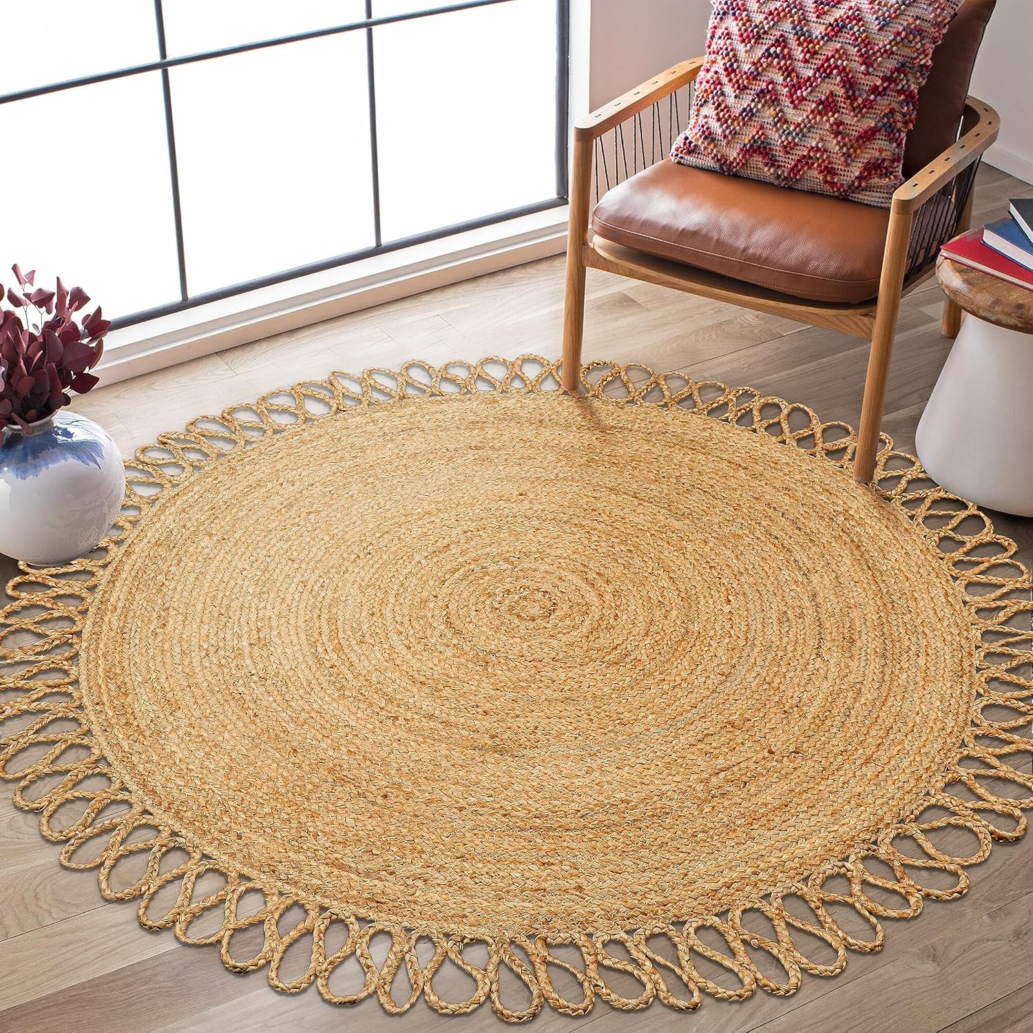 Natural Jute Area Rug with a scalloped edge, enhancing the cozy ambiance of a sunlit living space.