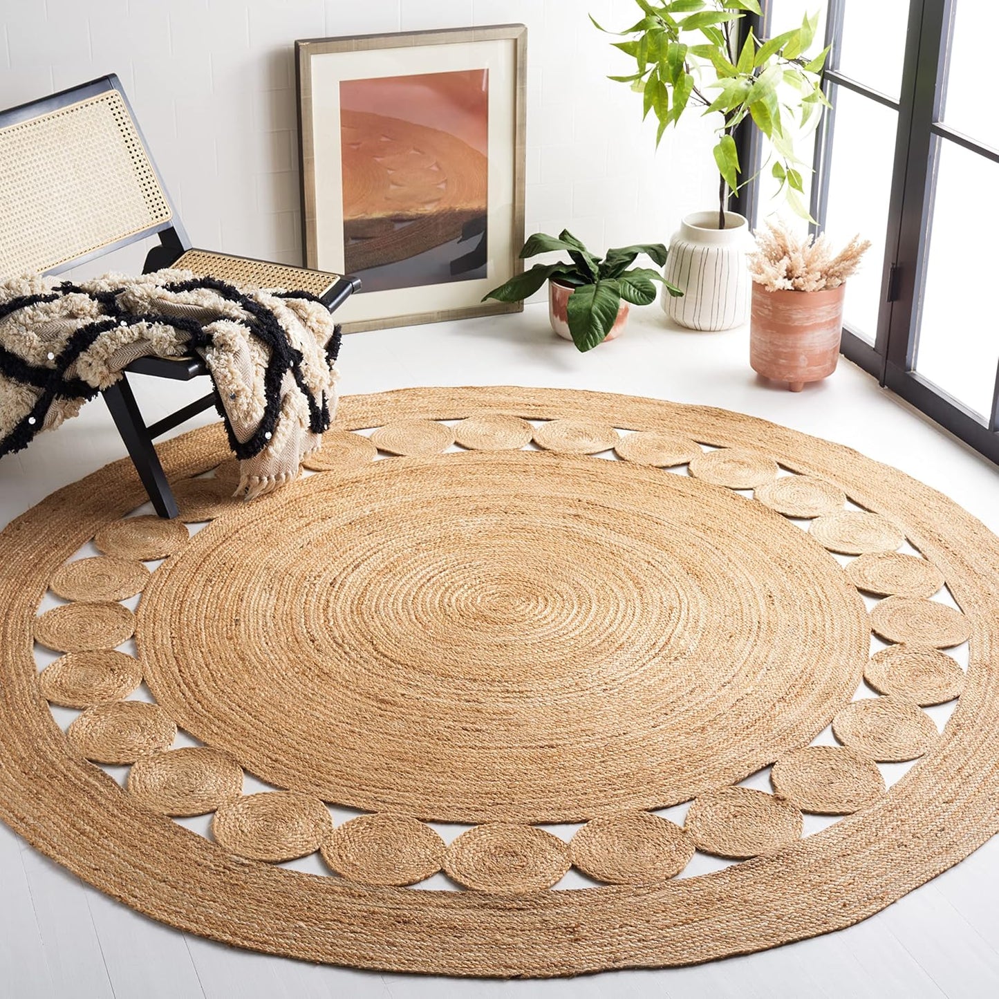 Round jute area rug with a circular pattern, natural beige color, perfect for boho home decor.