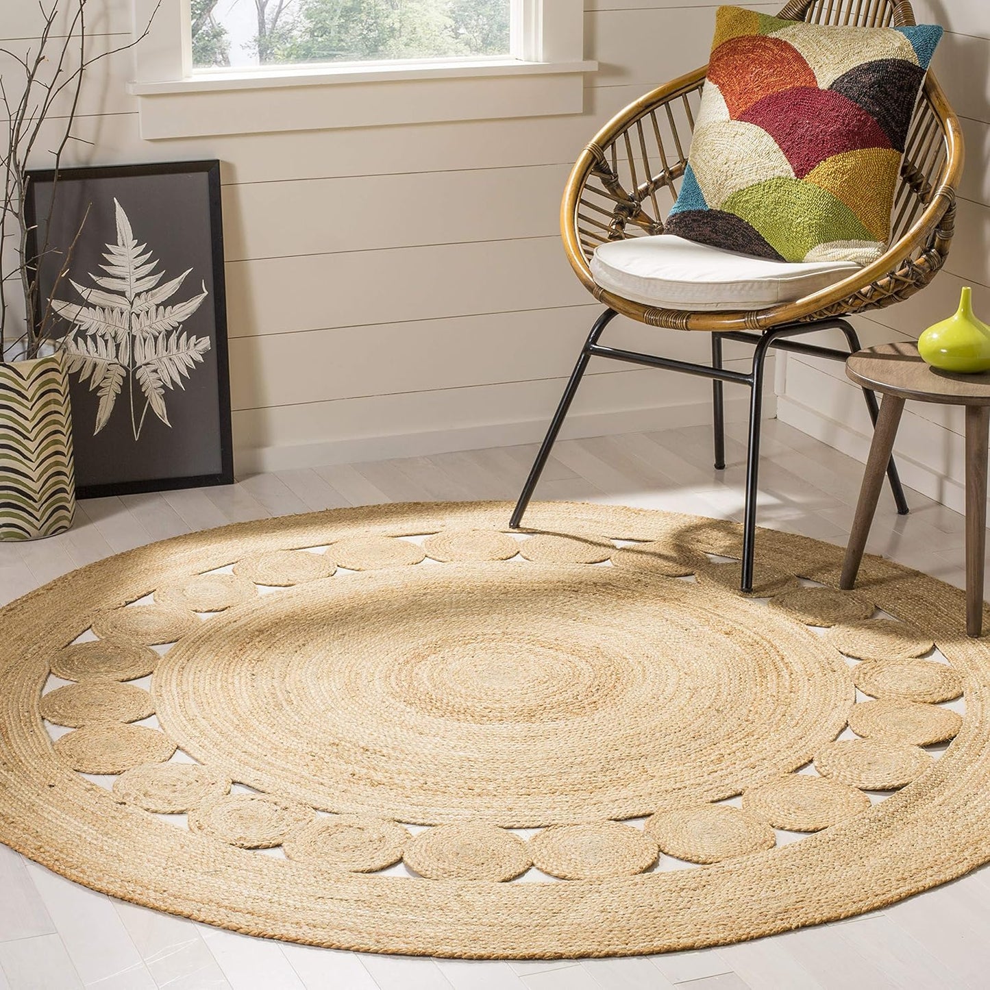 Natural jute round area rug, beige with intricate border design, perfect for cozy living spaces.