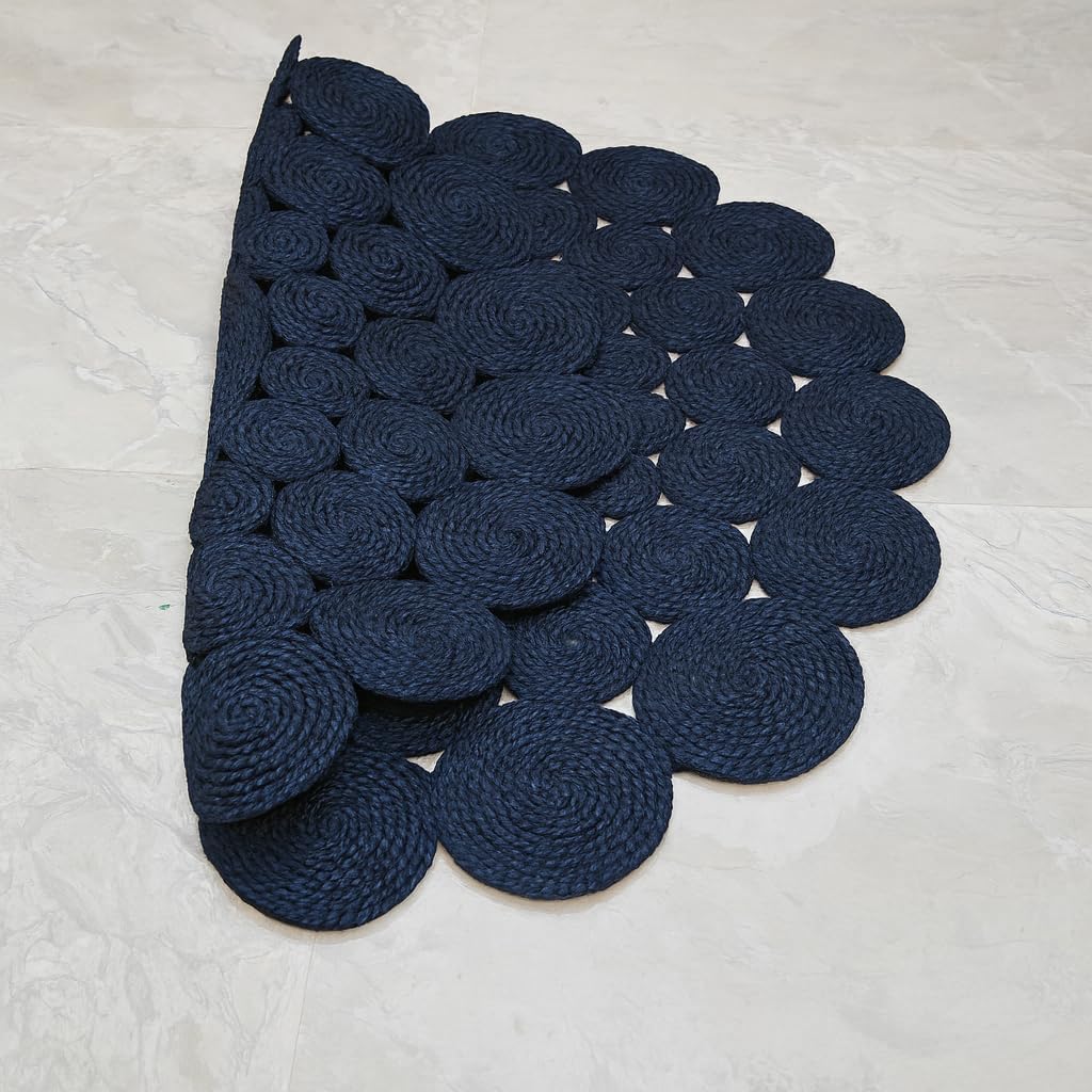 Natural Jute Area Rug featuring a scalloped design in deep navy, perfect for enhancing any entryway or living space.