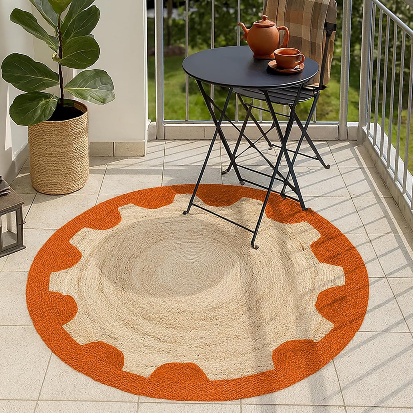Natural Jute Area Rug with a scalloped orange border, perfect for indoor or outdoor spaces.