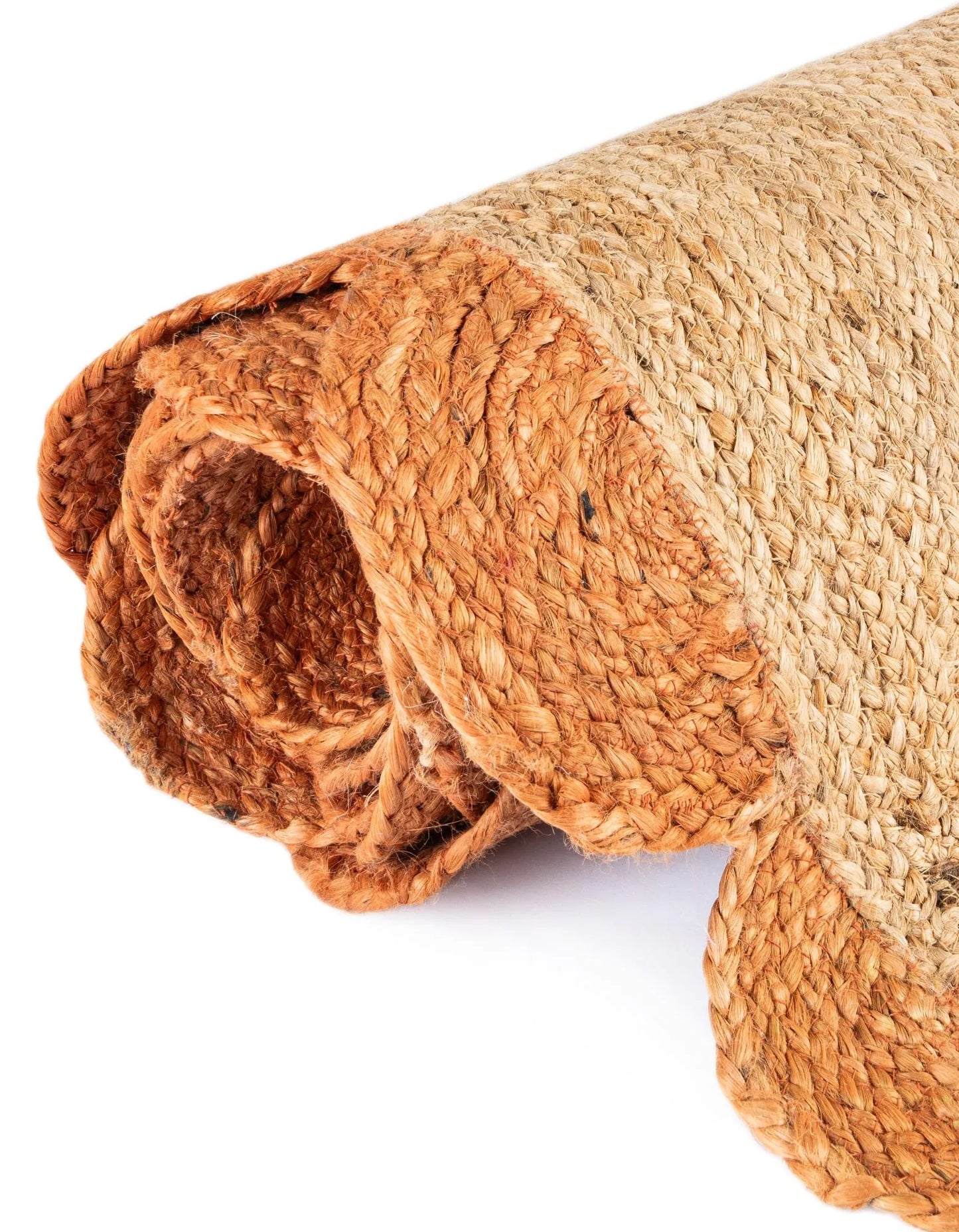Rolled jute mat on a white background