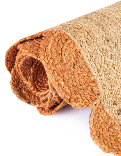 Rolled jute mat on a white background