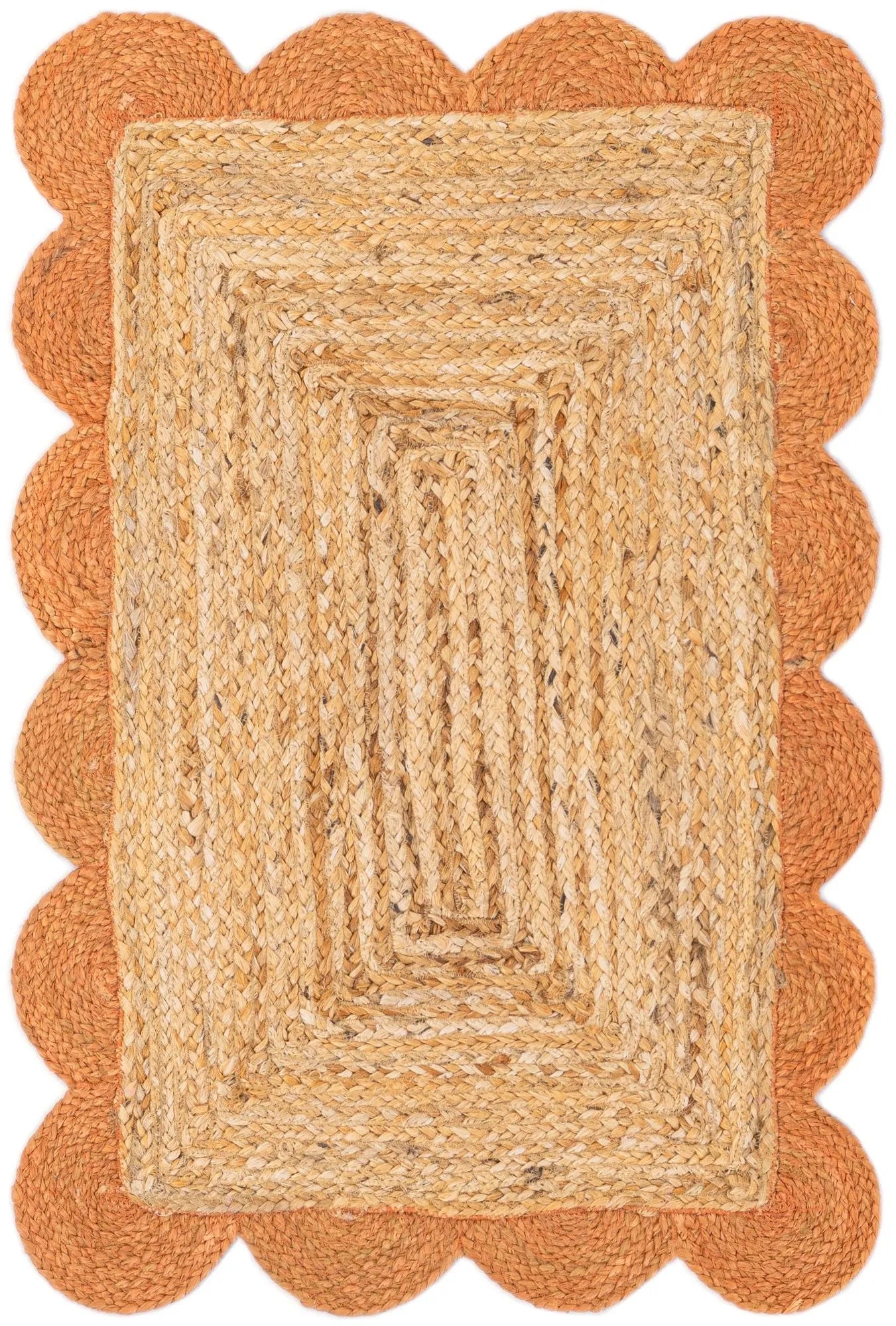 Rectangular jute rug with scalloped edge on a matching orange border