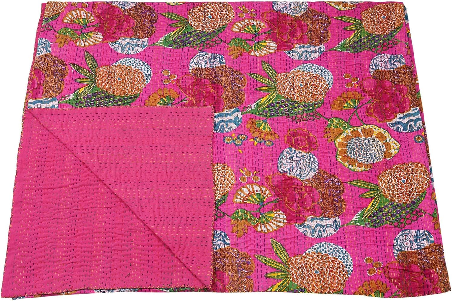Colorful floral patterned fabric on a pink background