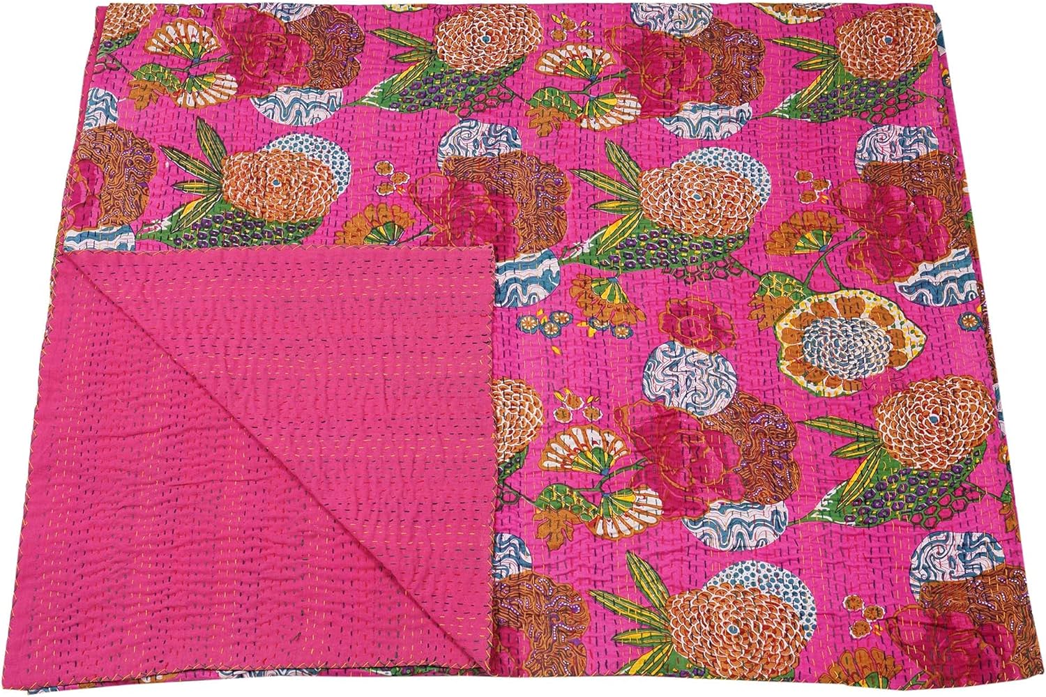 Colorful floral patterned fabric on a pink background