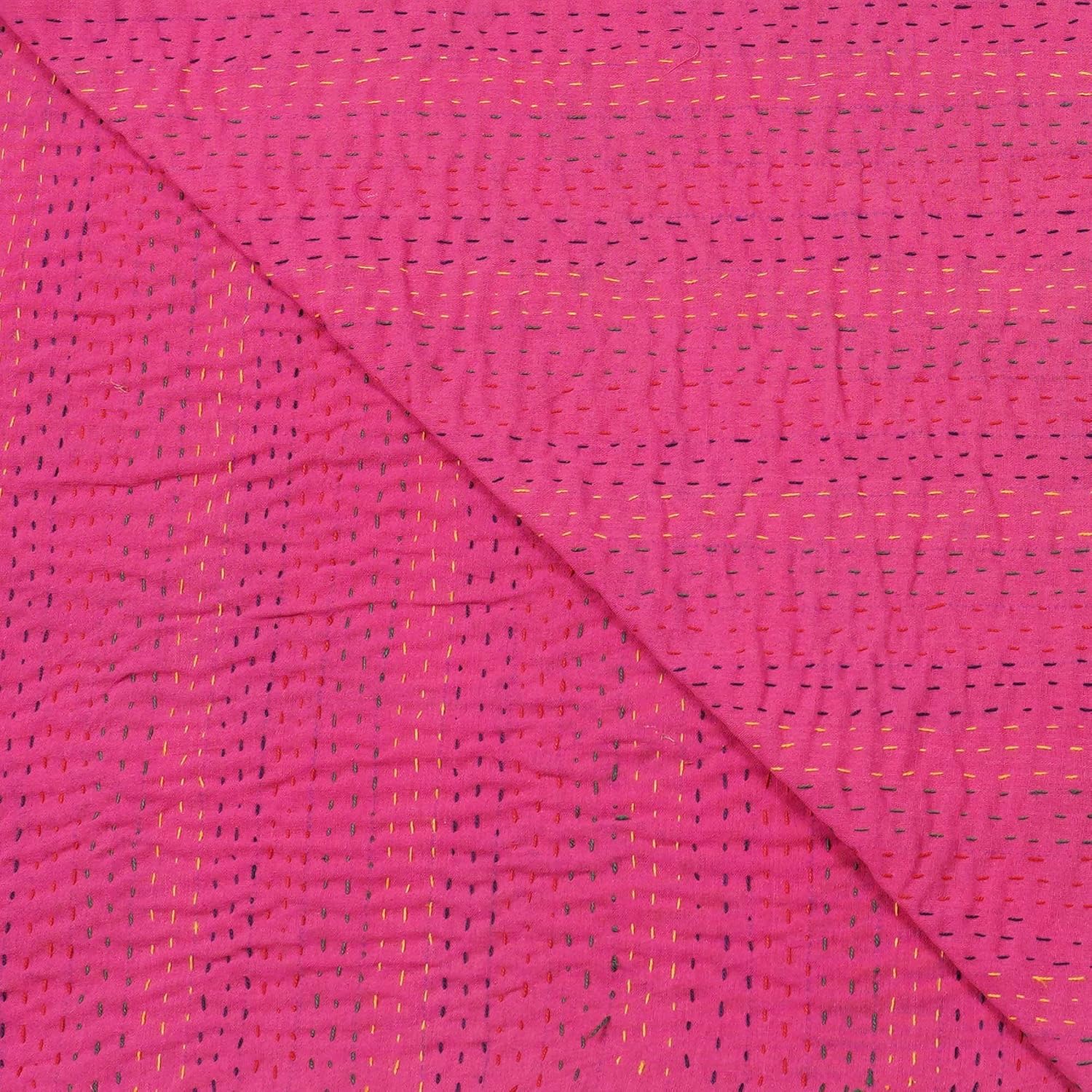 Close-up of pink fabric with a subtle pattern
