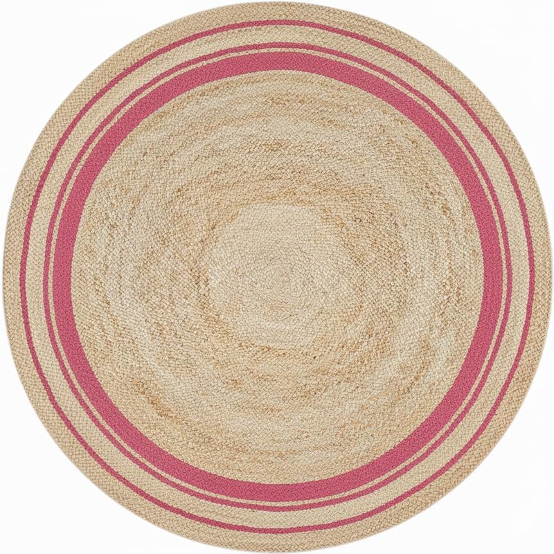 Round jute rug with pink stripes on a white background
