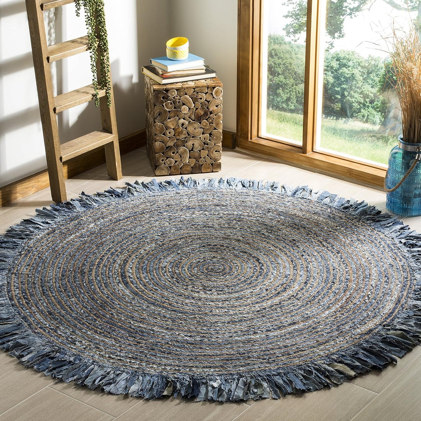 Natural Jute Area Rug with a textured finish, featuring a round shape and fringed edges, perfect for any living space.