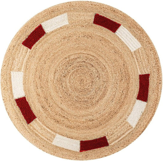 Round natural jute rug with red and white accents, perfect for enhancing home decor.