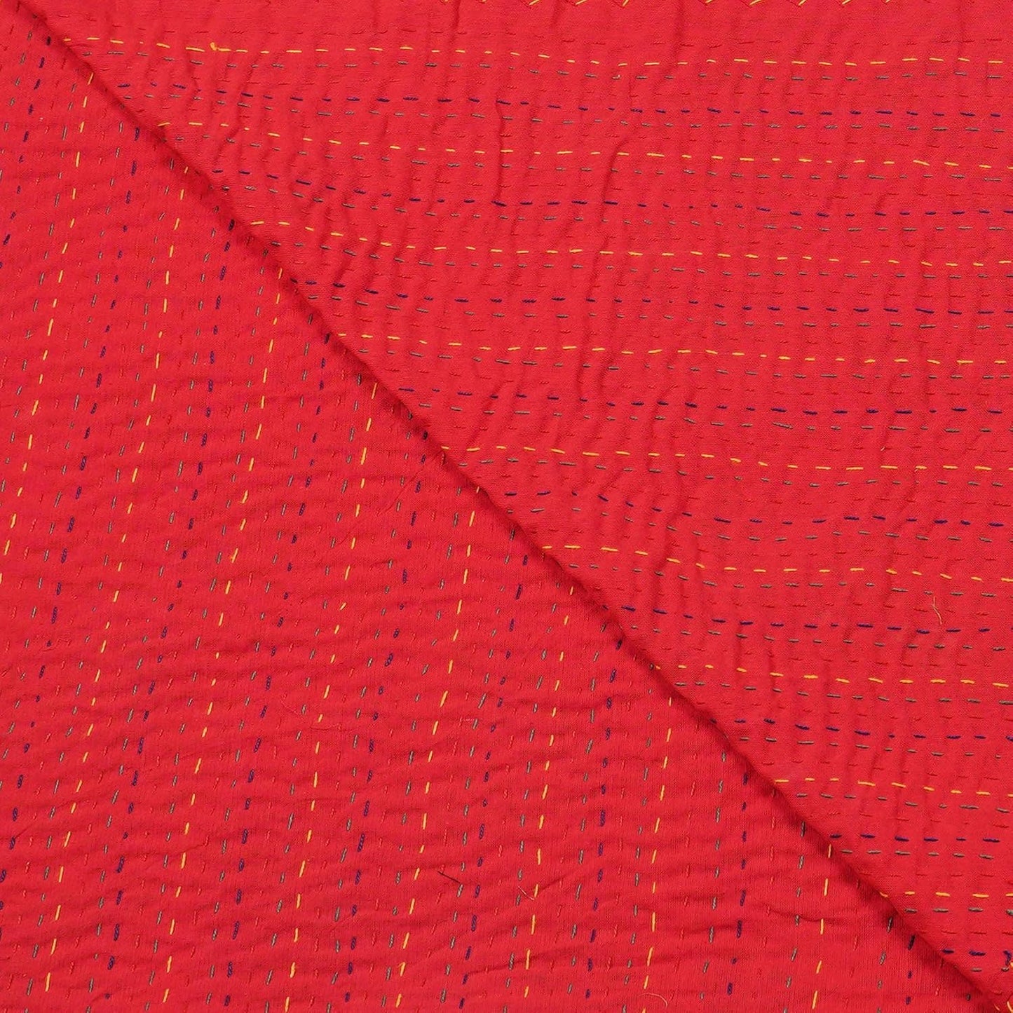 Red fabric with a subtle pattern