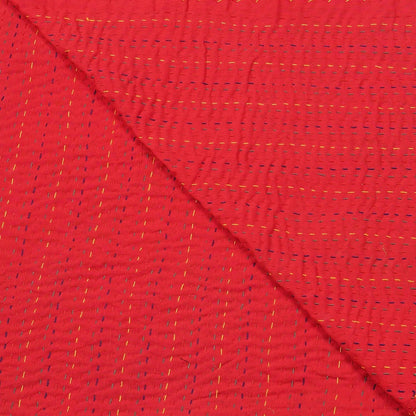 Red fabric with a subtle pattern