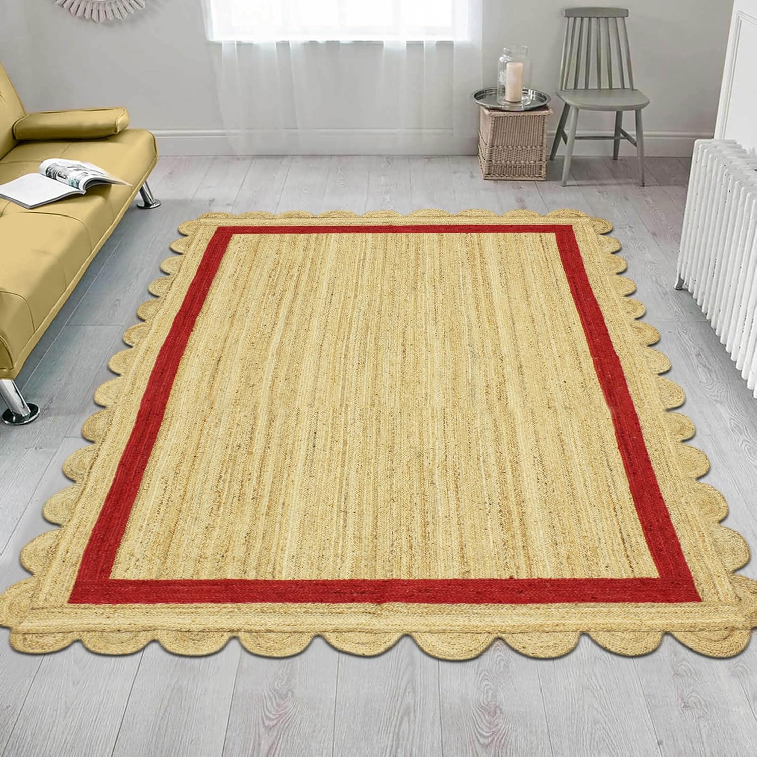 Natural Jute Area Rug with a scalloped edge and red border, enhancing the cozy atmosphere of any living space.