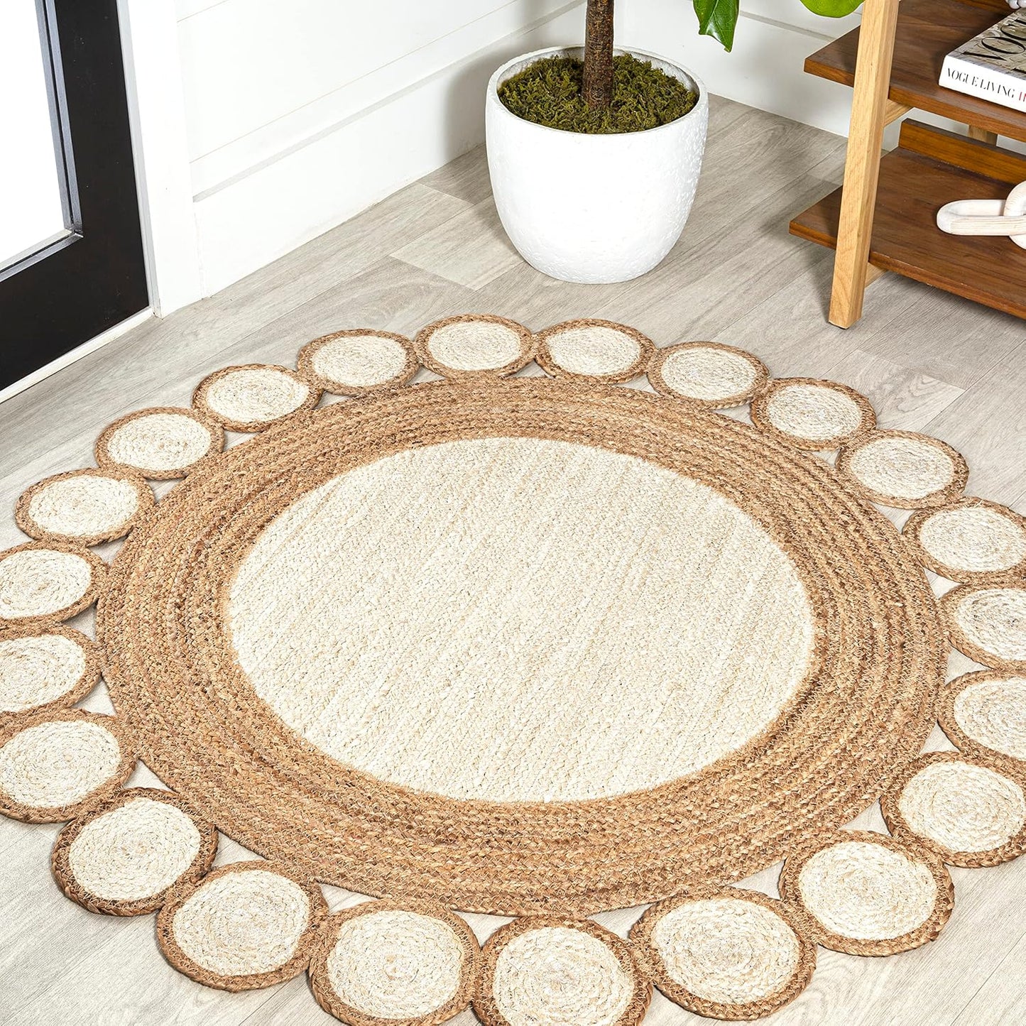 Natural Jute Area Rug with a scalloped edge design, perfect for adding a bohemian touch to any indoor space.
