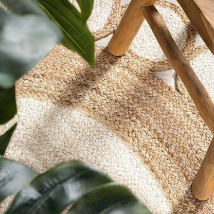 Natural Jute Area Rug with a textured weave, enhancing the cozy feel of any space while blending seamlessly with decor.