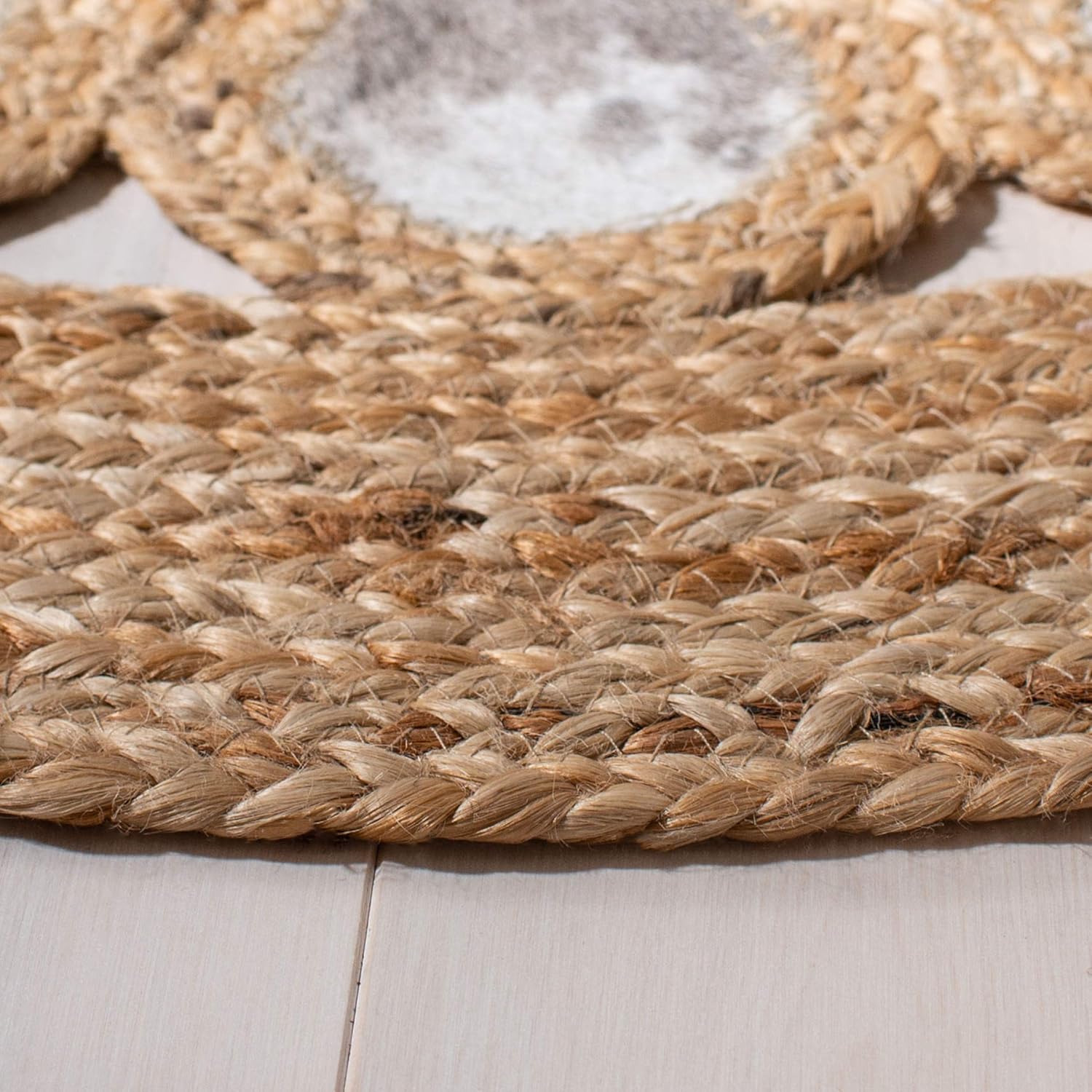 Natural Jute Area Rug with a textured weave, perfect as a floor carpet or bedside runner in a cozy setting.