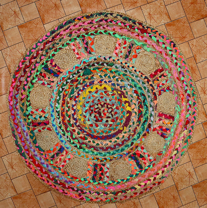 Colorful braided rug on a wooden floor