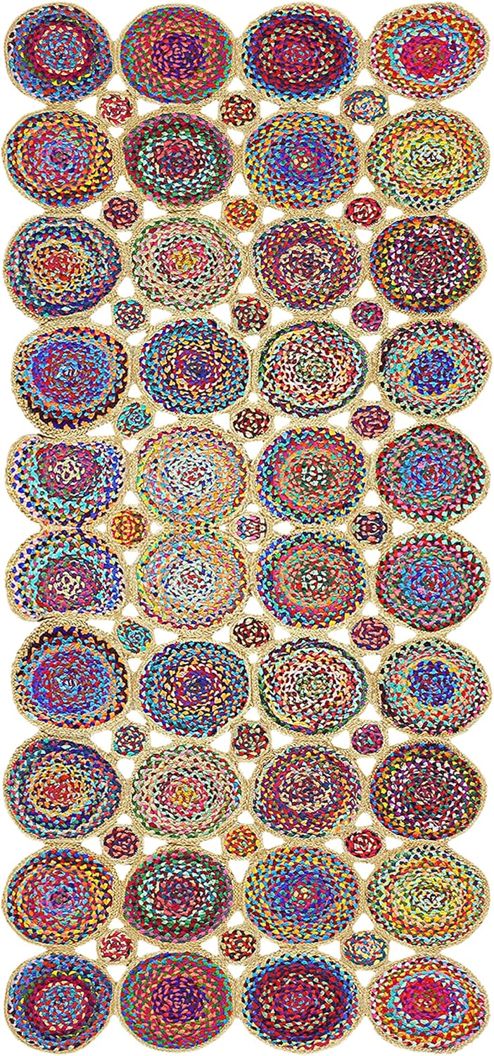 A collection of colorful circular woven rugs or mats arranged in a grid on a white background. Each rug features intricate concentric patterns in multiple vibrant colors including red, blue, yellow, green, and purple, with some displaying a gold-toned braided border.