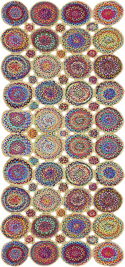 A collection of colorful circular woven rugs or mats arranged in a grid on a white background. Each rug features intricate concentric patterns in multiple vibrant colors including red, blue, yellow, green, and purple, with some displaying a gold-toned braided border.