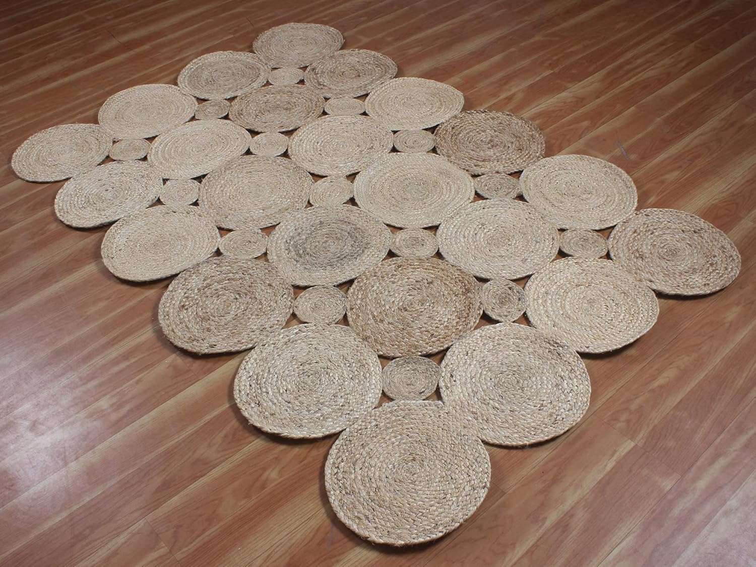 Natural Jute Area Rug with a unique circular design — handcrafted from eco-friendly materials for a textured look.