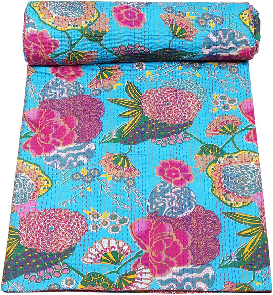 Turquoise Kantha quilt by Handmade Floral Cotton Blanket, featuring a vintage bedspread and floral patterns.
