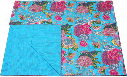 Turquoise Kantha quilt from handmade floral cotton blanket with vintage bedspread design.