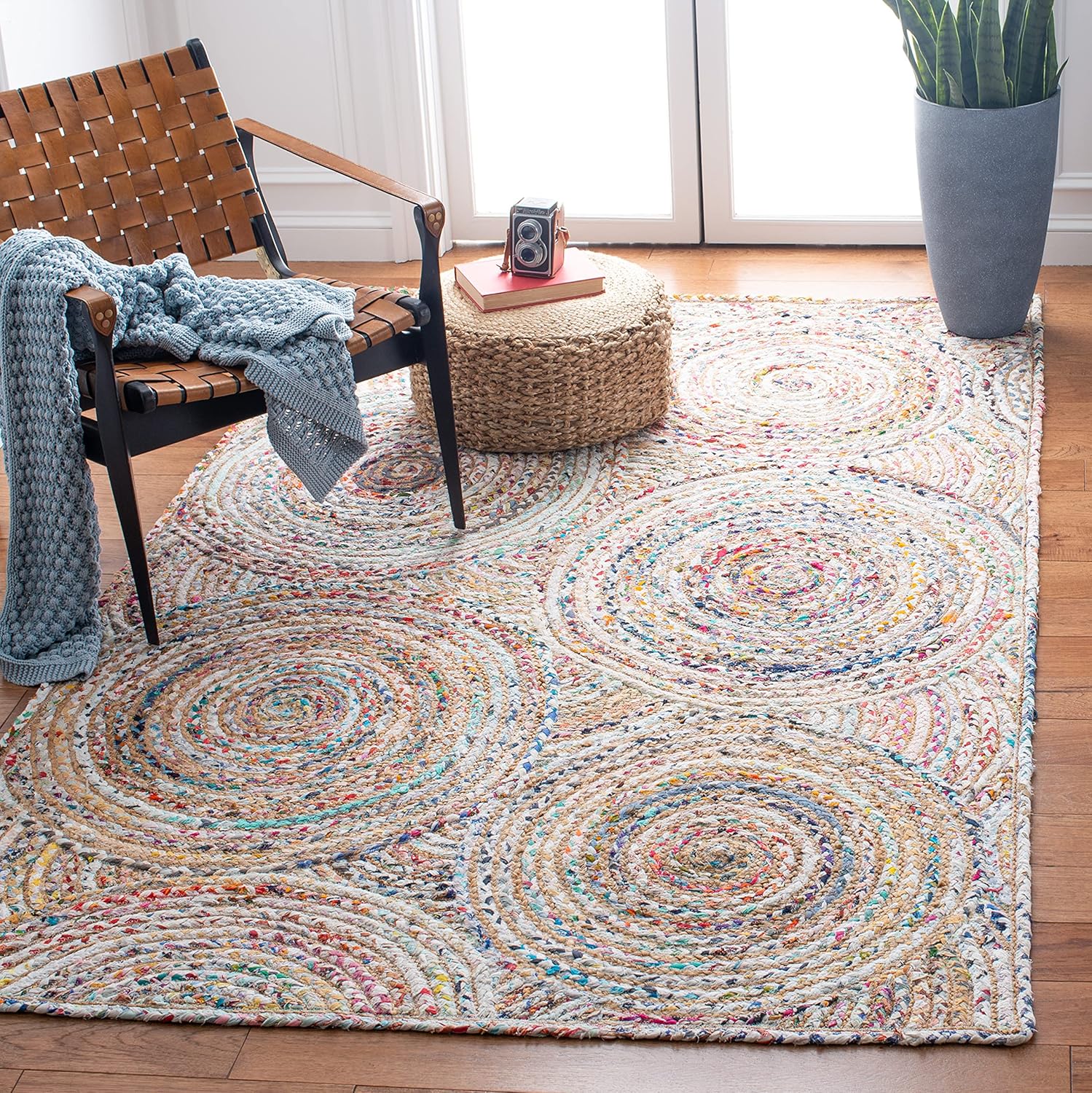 Natural Jute Area Rug featuring a vibrant circular pattern — perfect for adding texture to any living space.