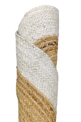 Rolled-up jute rug with natural beige and white pattern on a white background