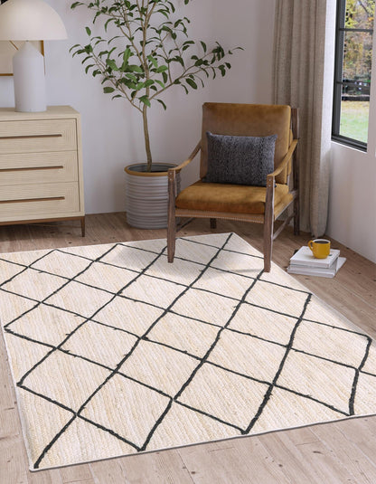 Living room with a patterned rug, chair, and decor items.