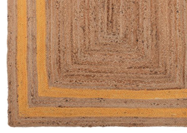 Close-up of a textured rug with brown and yellow colors.