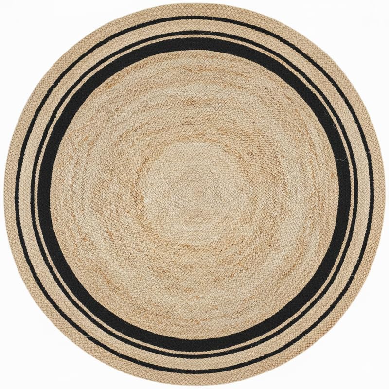 Round beige rug with black border on a white background