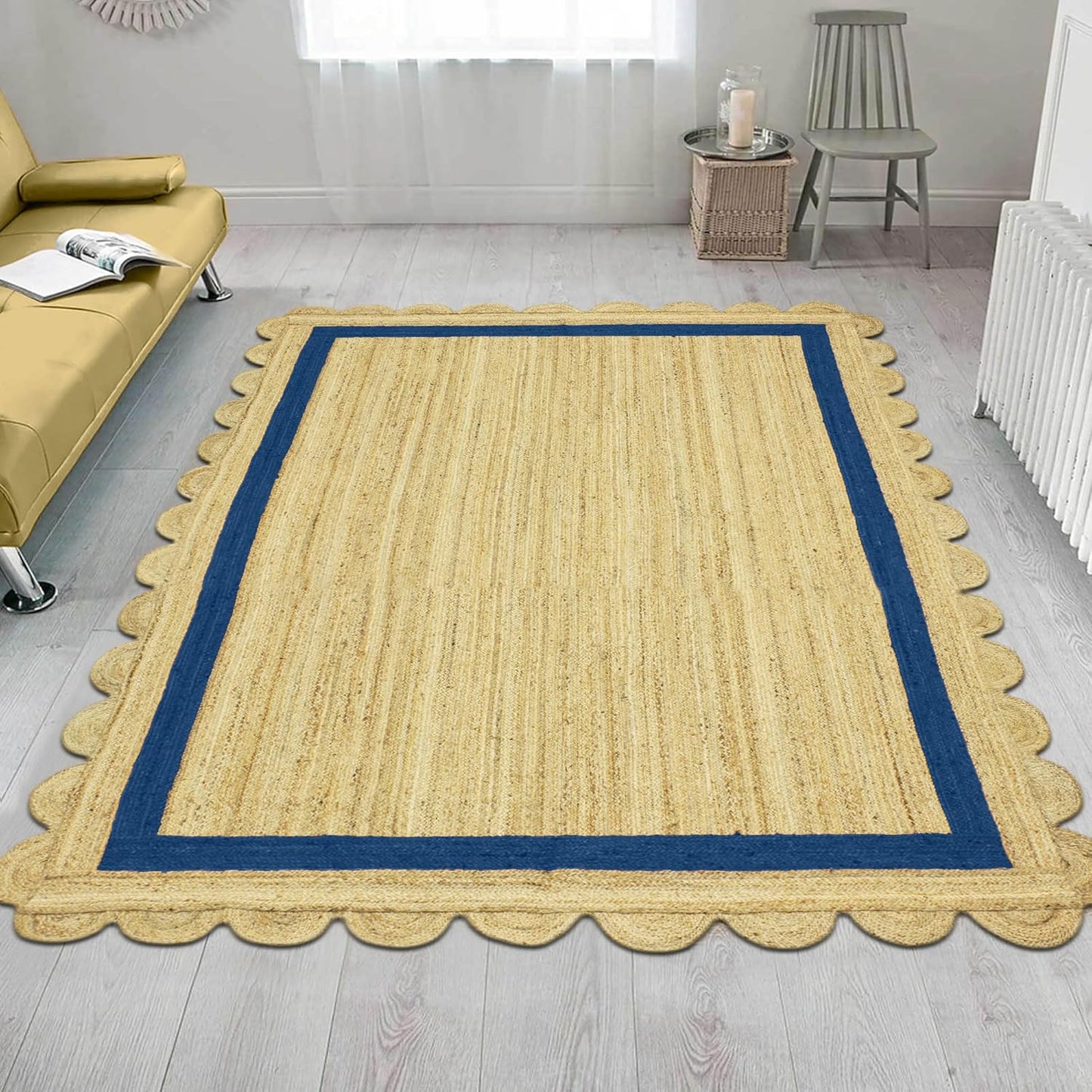 Natural Jute Area Rug with scalloped edges and navy border, perfect for adding texture to any living space.